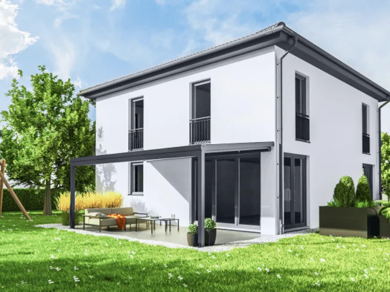 Terrassenüberdachung aus Aluminium mit Glaseindeckung an einem Einfamilienhaus